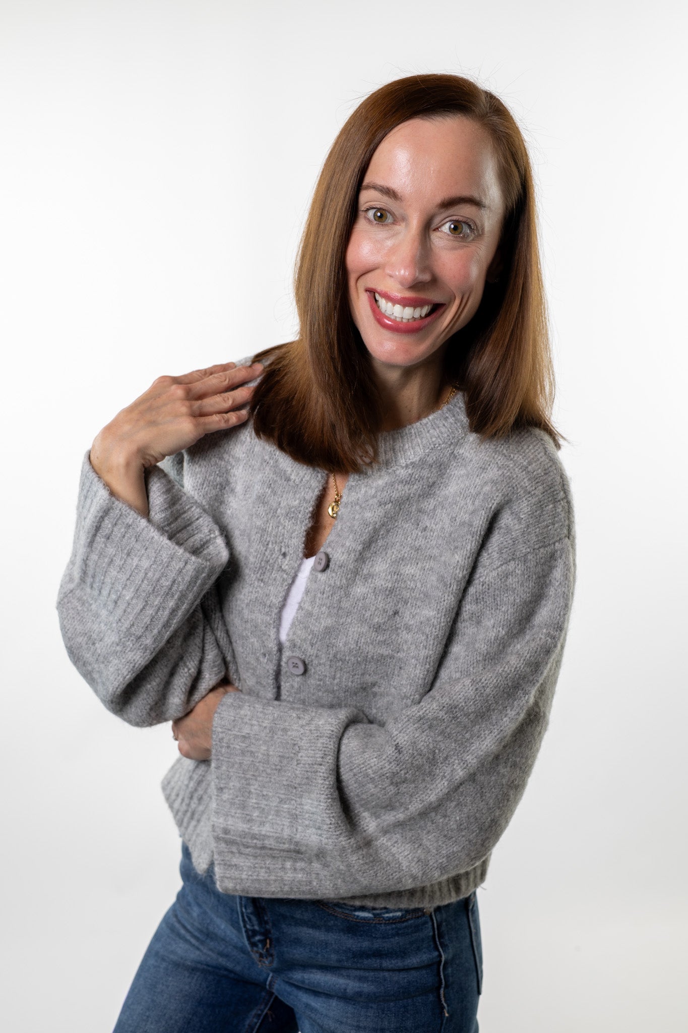 Chunky gray knit cardigan with large buttons styled casually with jeans — soft, cozy boutique sweater for fall and winter from Salt & Lavender Clothing.