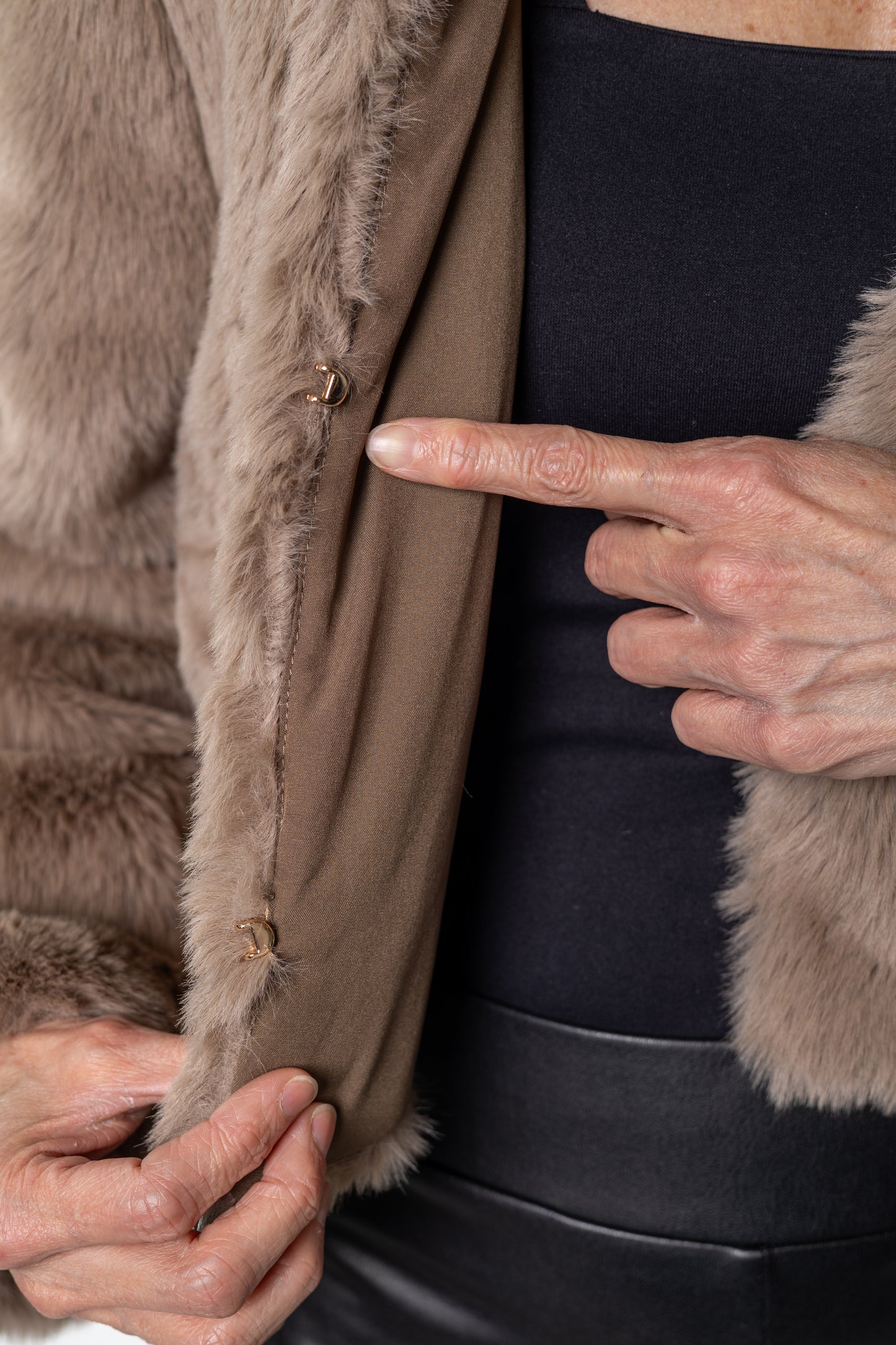 Neutral faux-fur cropped jacket in soft taupe tones — statement outerwear from Salt & Lavender Clothing that blends comfort, warmth, and timeless charm.