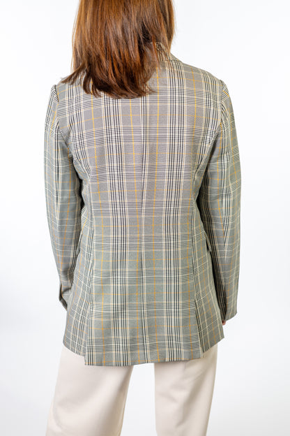 woman wearing plaid blazer