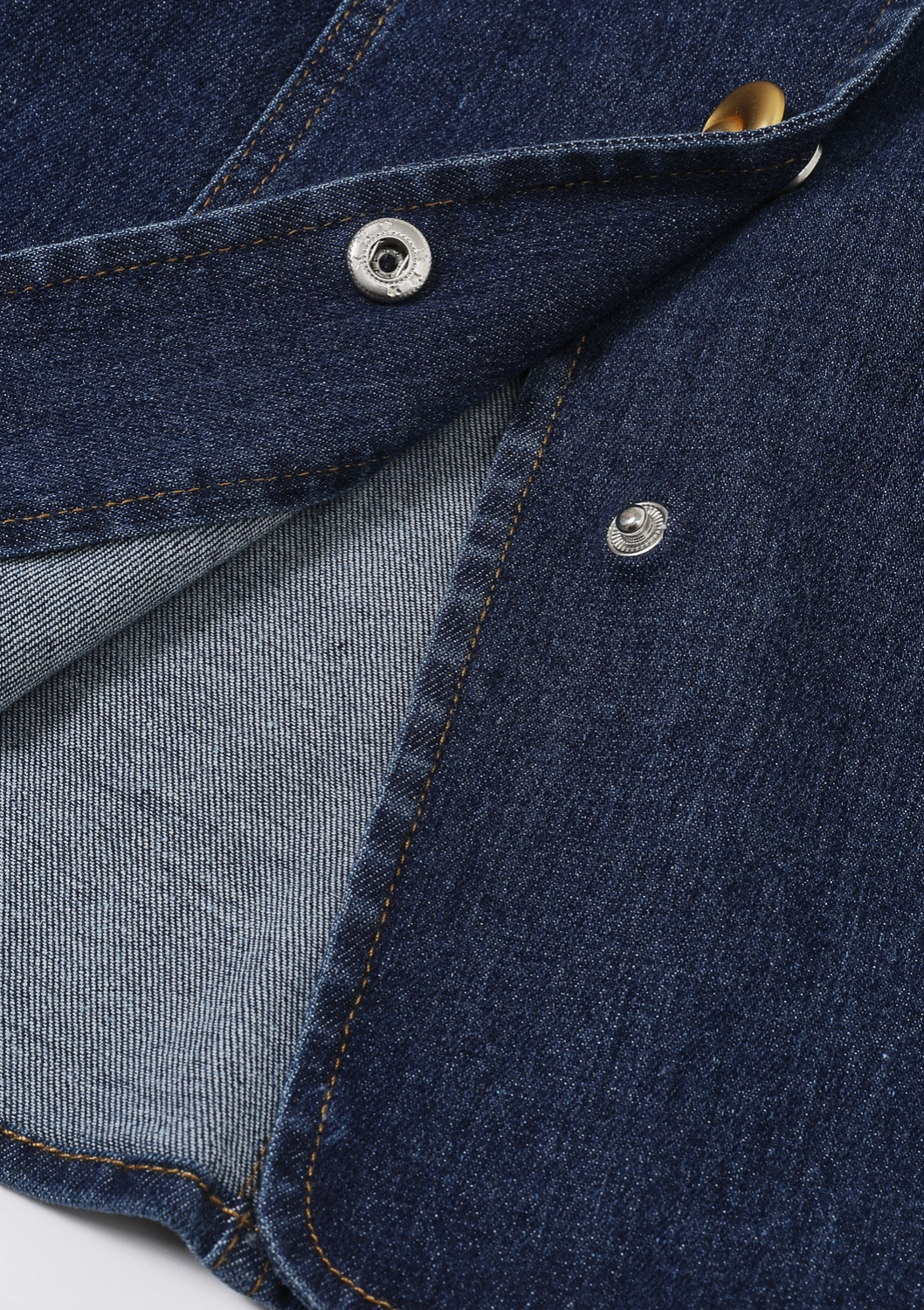 Denim vest with gold buttons